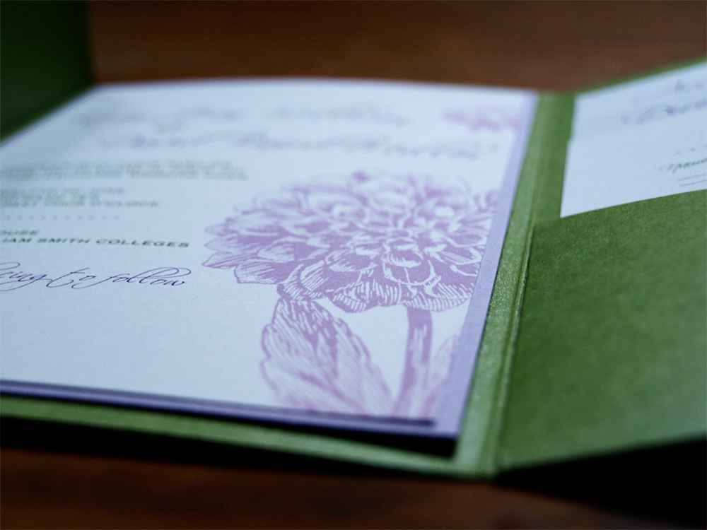  green pocket folder and purple and green in the invitation pieces with 